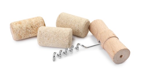 Photo of Corkscrew with wooden handle and corks isolated on white