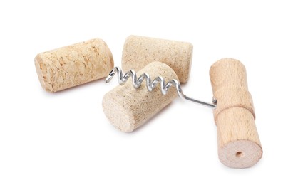 Photo of Corkscrew with wooden handle and corks isolated on white