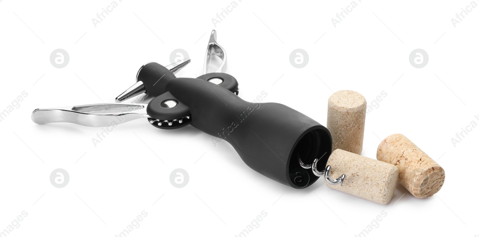 Photo of Wing corkscrew and corks isolated on white