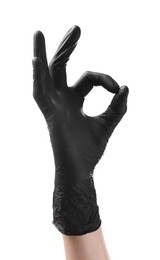 Photo of Man in black latex glove showing OK gesture on white background, closeup