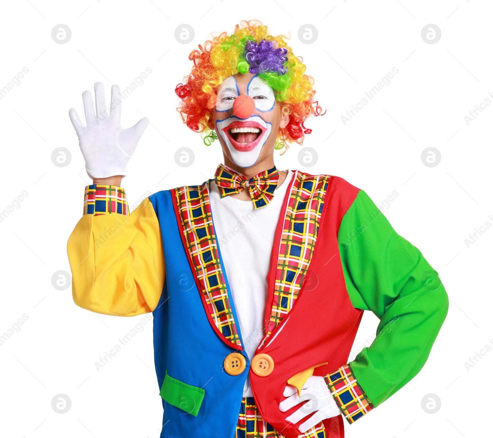 Photo of Portrait of happy clown waving on white background