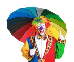 Happy clown with colorful umbrella on white background