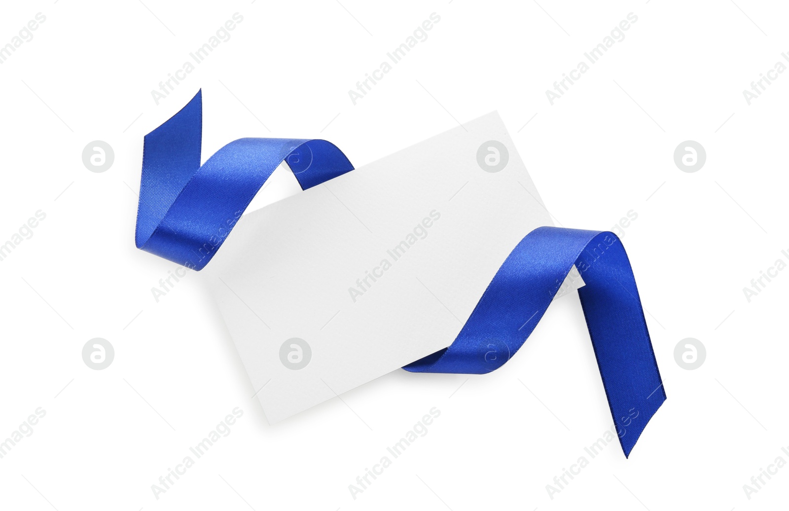 Photo of Blank card and blue ribbon isolated on white, top view