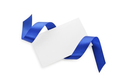 Photo of Blank card and blue ribbon isolated on white, top view