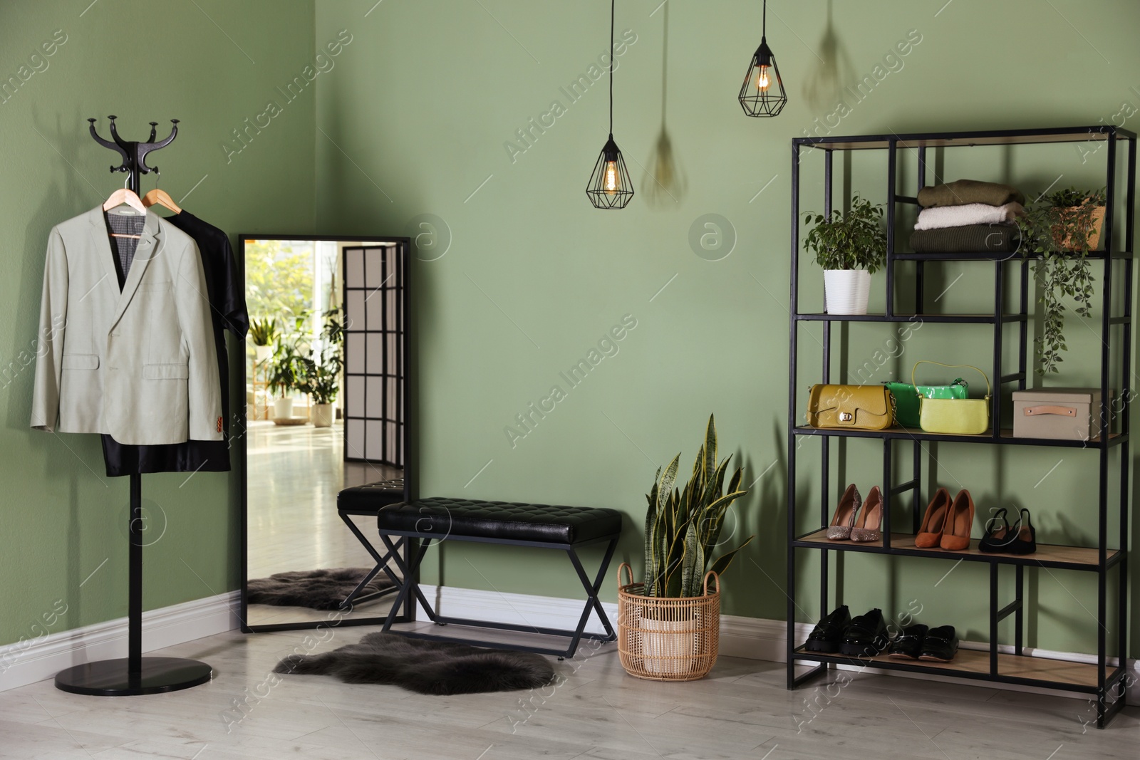 Photo of Stylish hallway interior with mirror and shelving unit