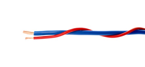 Photo of Two twisted electrical wires on white background