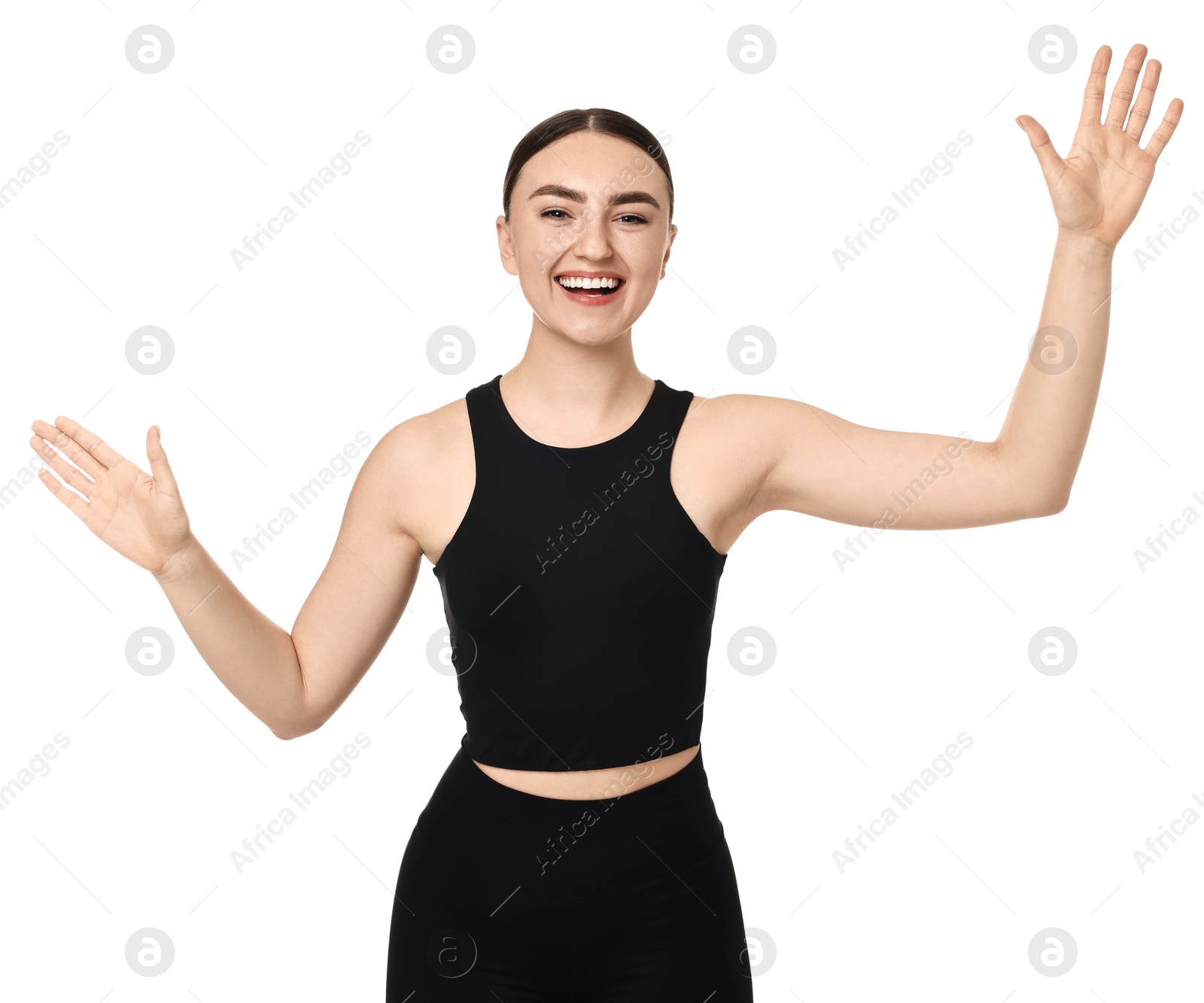 Photo of Beautiful woman in sportswear running on white background