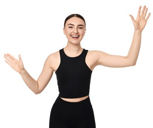 Beautiful woman in sportswear running on white background