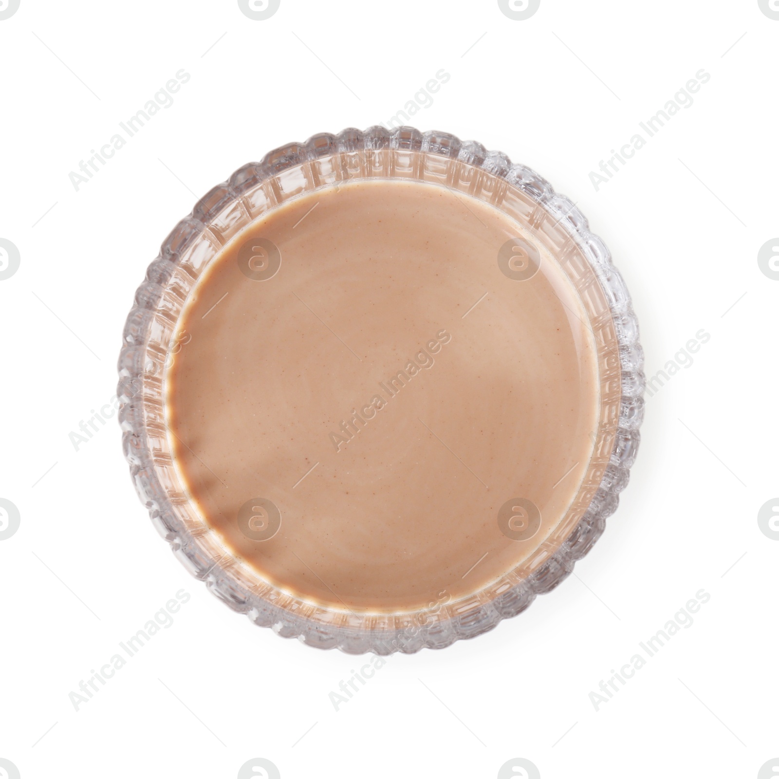 Photo of Delicious protein shake in glass isolated on white, top view