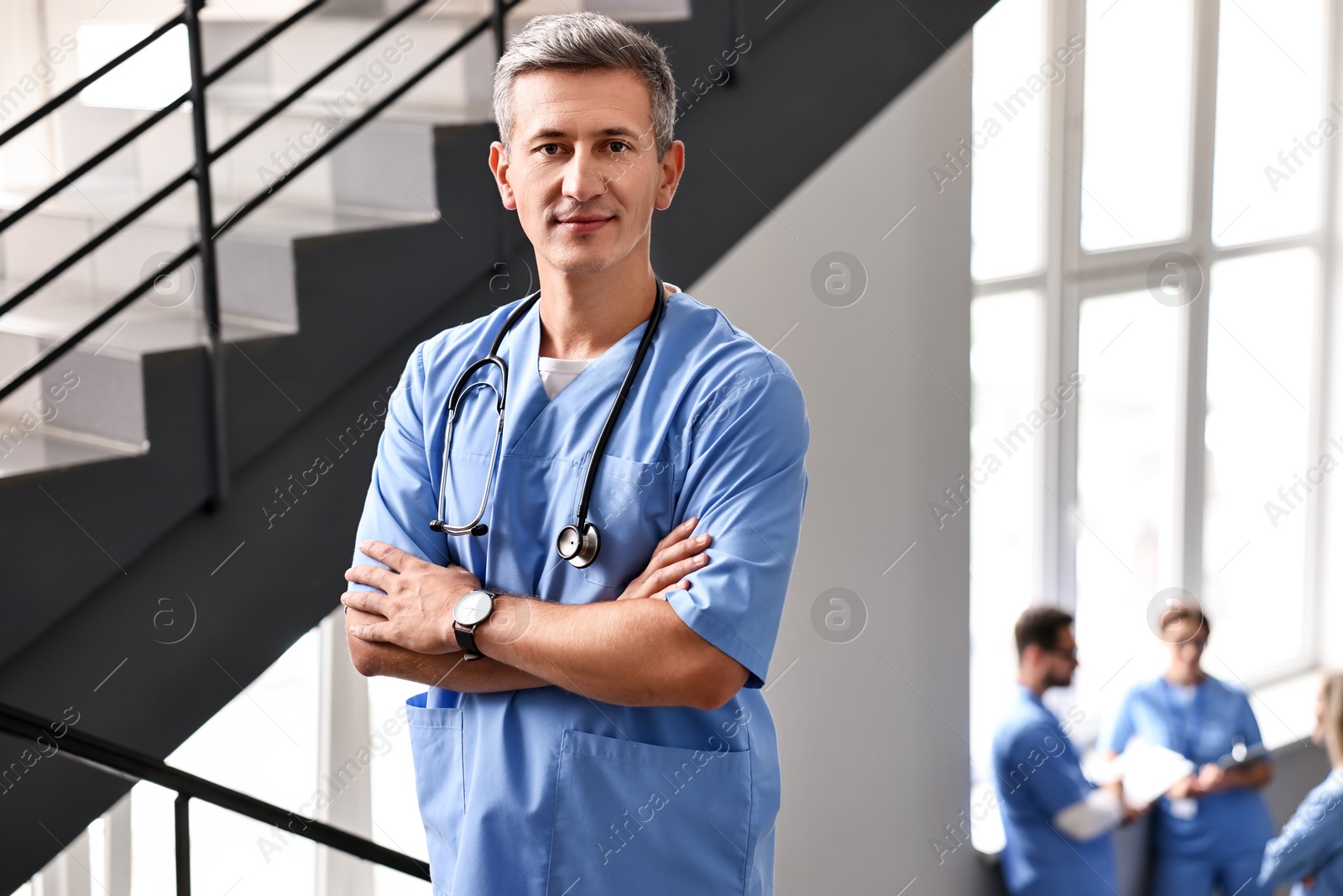 Photo of Portrait of healthcare worker with stethoscope in hospital