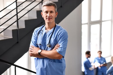 Portrait of healthcare worker with stethoscope in hospital