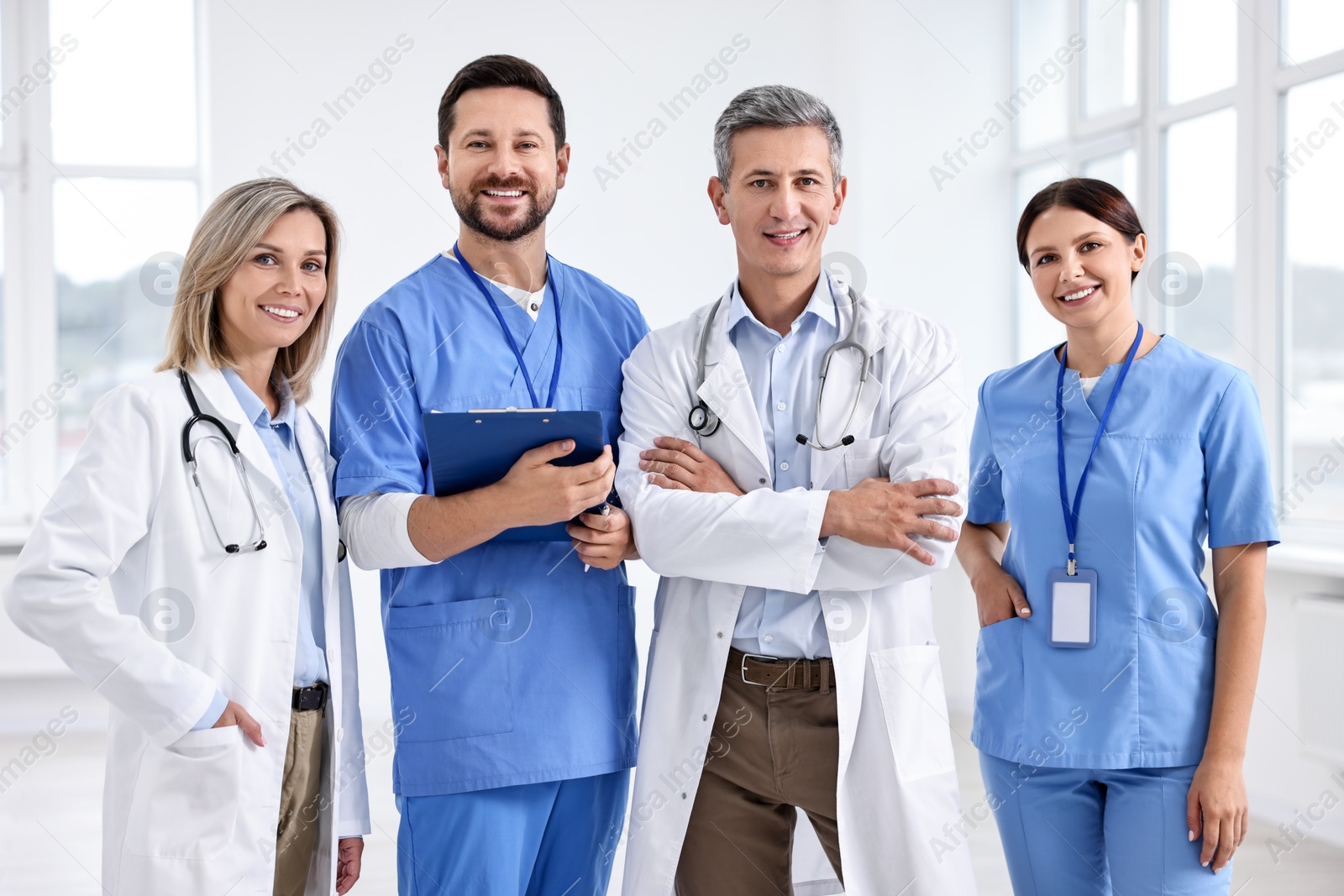 Photo of Portrait of smiling healthcare workers in hospital