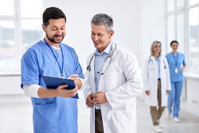 Photo of Healthcare workers in hospital, selective focus. Medical service