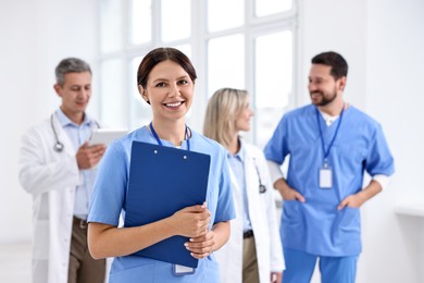 Photo of Healthcare workers in hospital, selective focus. Medical service