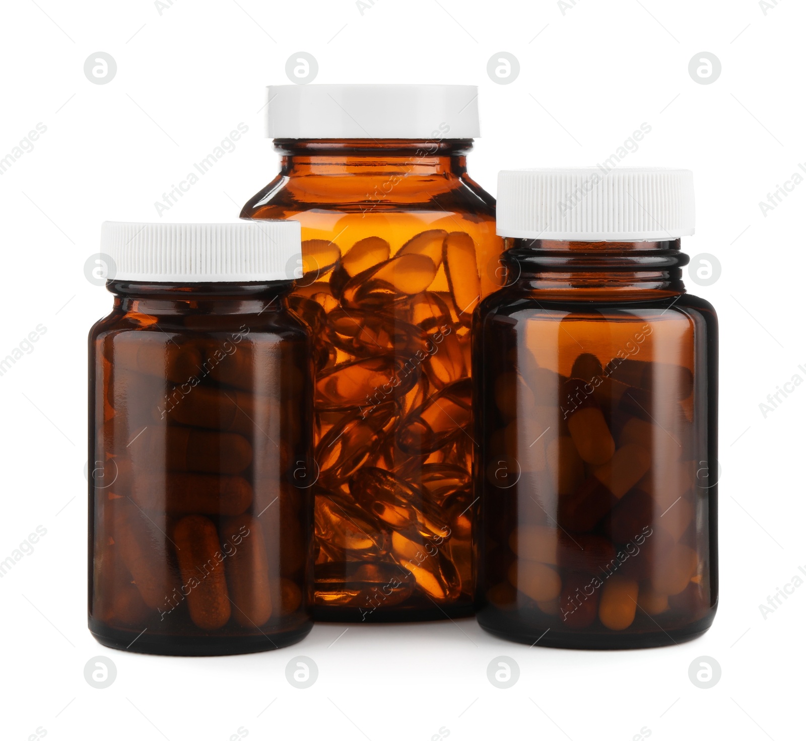 Photo of Medical bottles with pills isolated on white