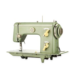 Photo of One vintage sewing machine isolated on white