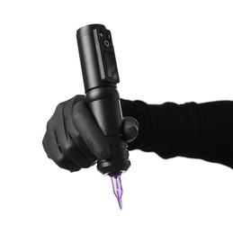 Photo of Professional artist in gloves holding tattoo machine on white background, closeup