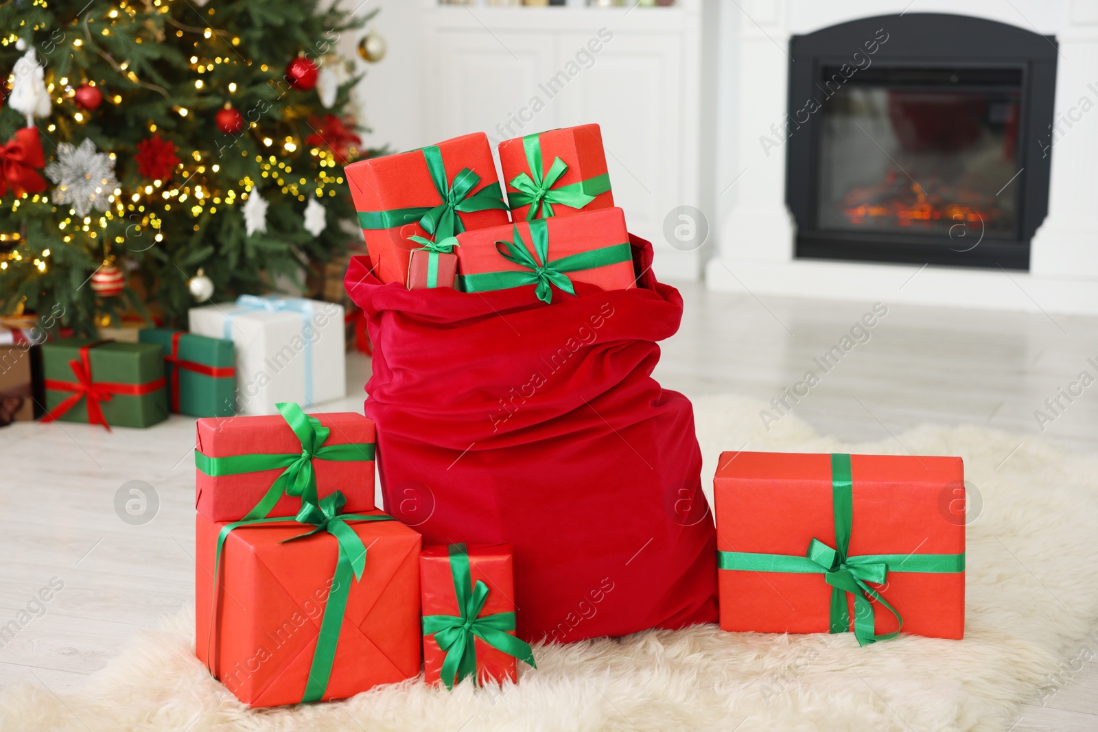 Photo of Santa bag full of Christmas presents at home