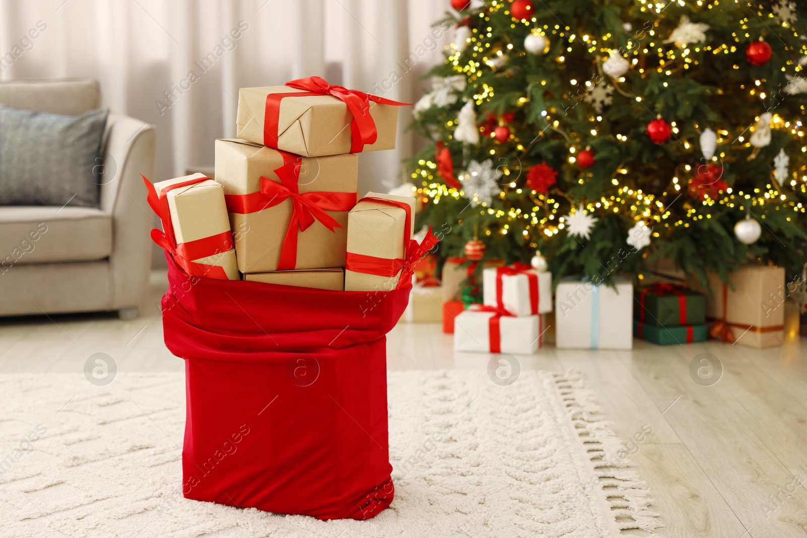 Photo of Santa bag full of Christmas presents at home