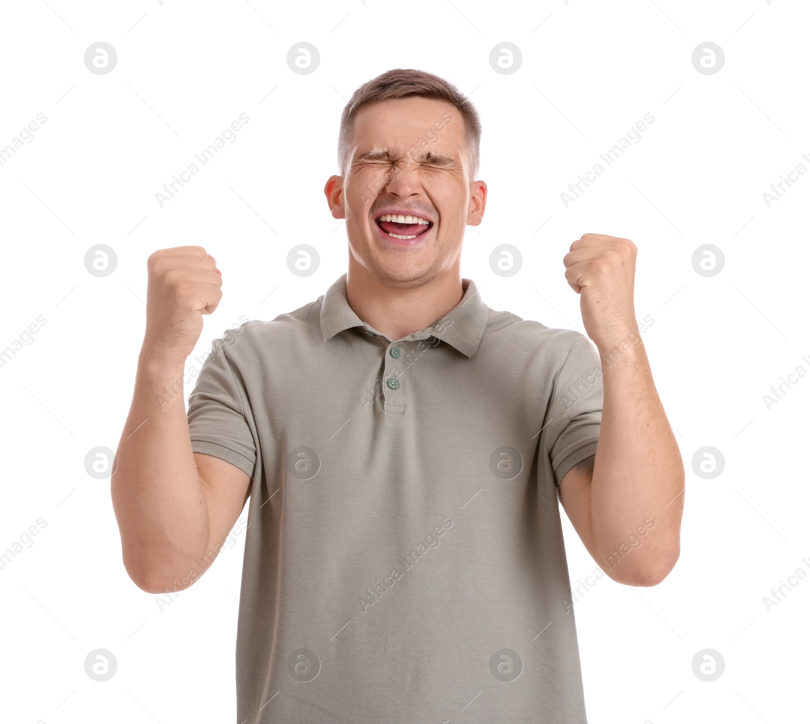 Photo of Portrait of happy winner on white background