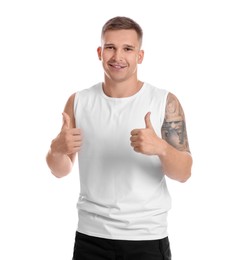 Happy winner showing thumbs up on white background