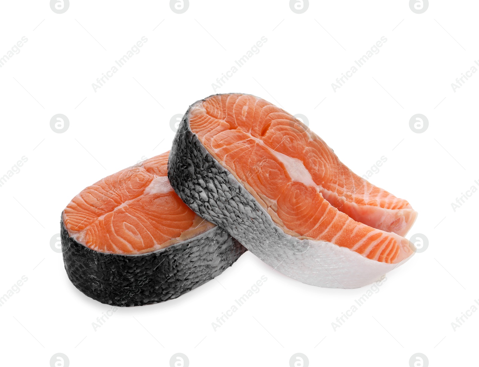 Photo of Steaks of fresh raw salmon isolated on white