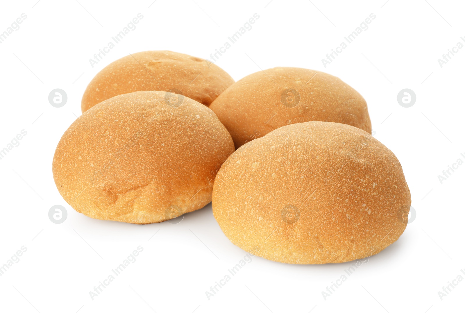 Photo of Many fresh tasty buns isolated on white