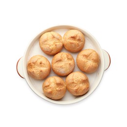 Photo of Baking dish with homemade tasty buns isolated on white, top view