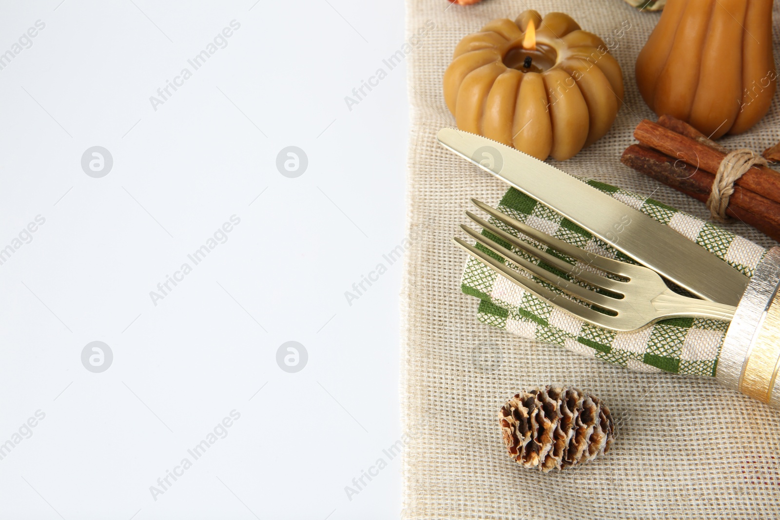 Photo of Beautiful table setting with autumnal decor on white background