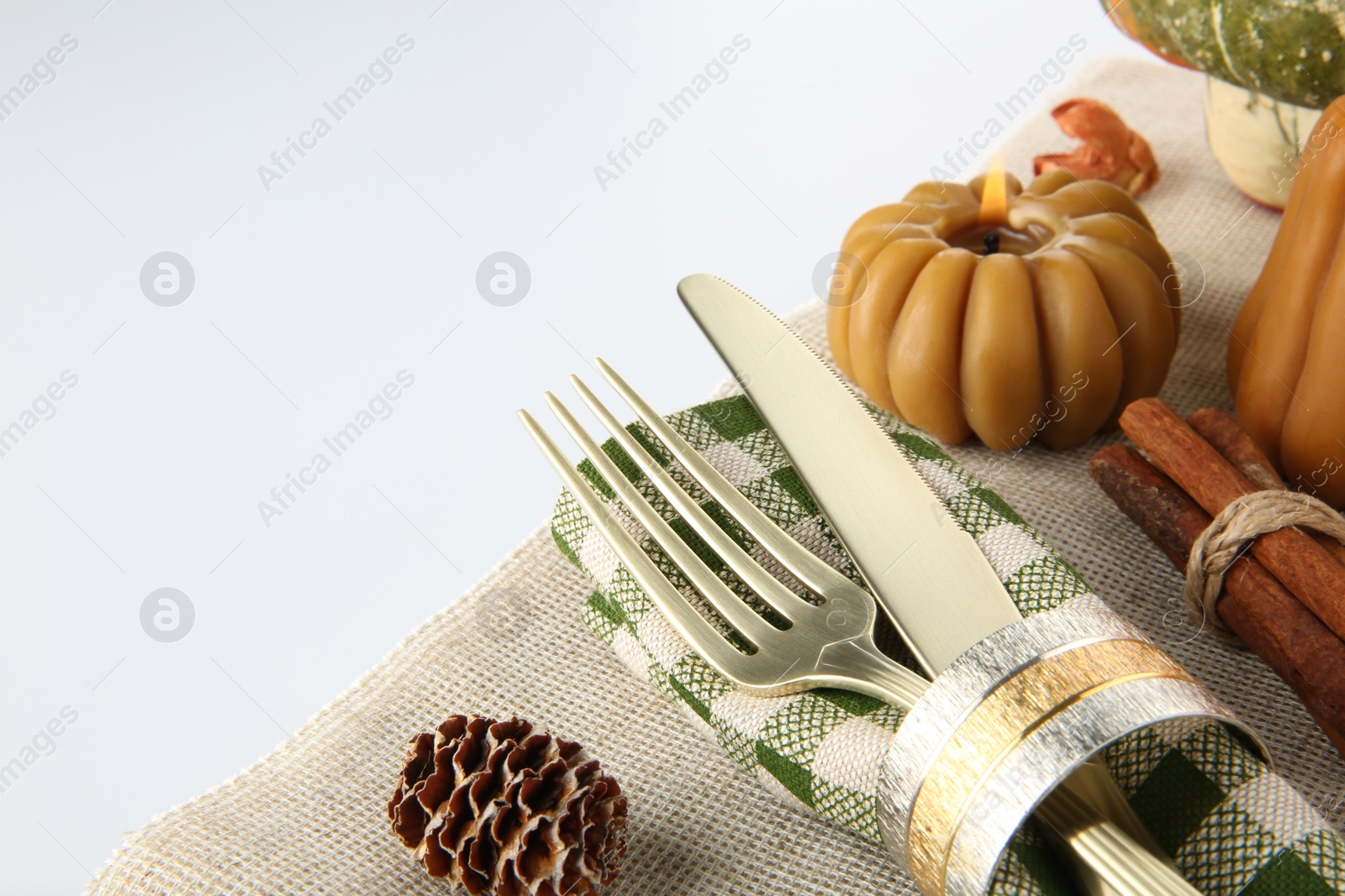 Photo of Beautiful table setting with autumnal decor on white background