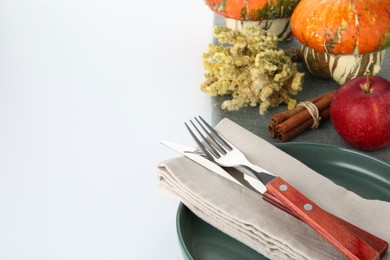 Photo of Beautiful table setting with autumnal decor on white background