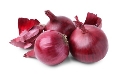 Photo of Fresh onions with peels isolated on white