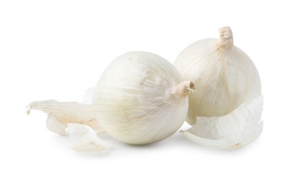 Photo of Fresh onions with peels isolated on white