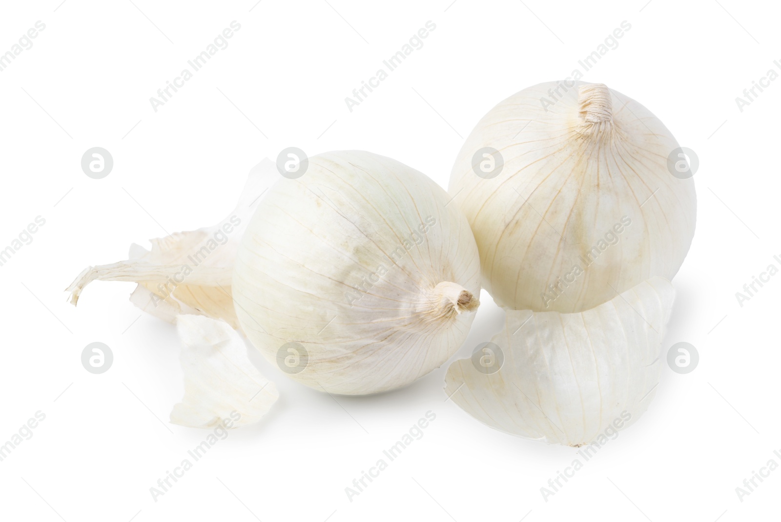 Photo of Fresh onions with peels isolated on white