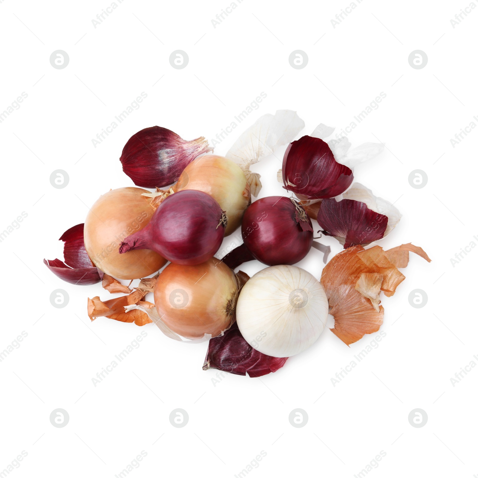 Photo of Fresh onions with peels isolated on white, top view