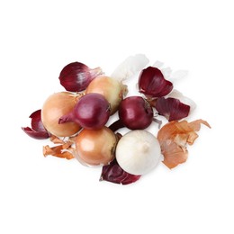 Photo of Fresh onions with peels isolated on white, top view