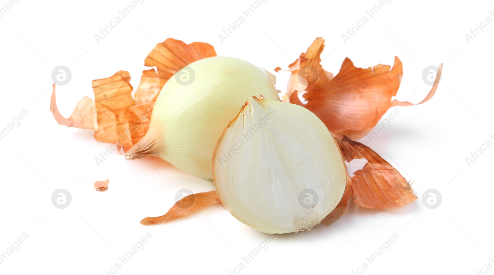 Photo of Fresh onions with peels isolated on white