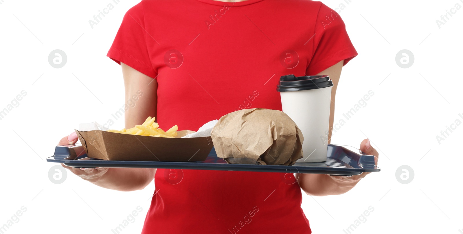 Photo of Fast-food worker holding tray with order on white background, closeup