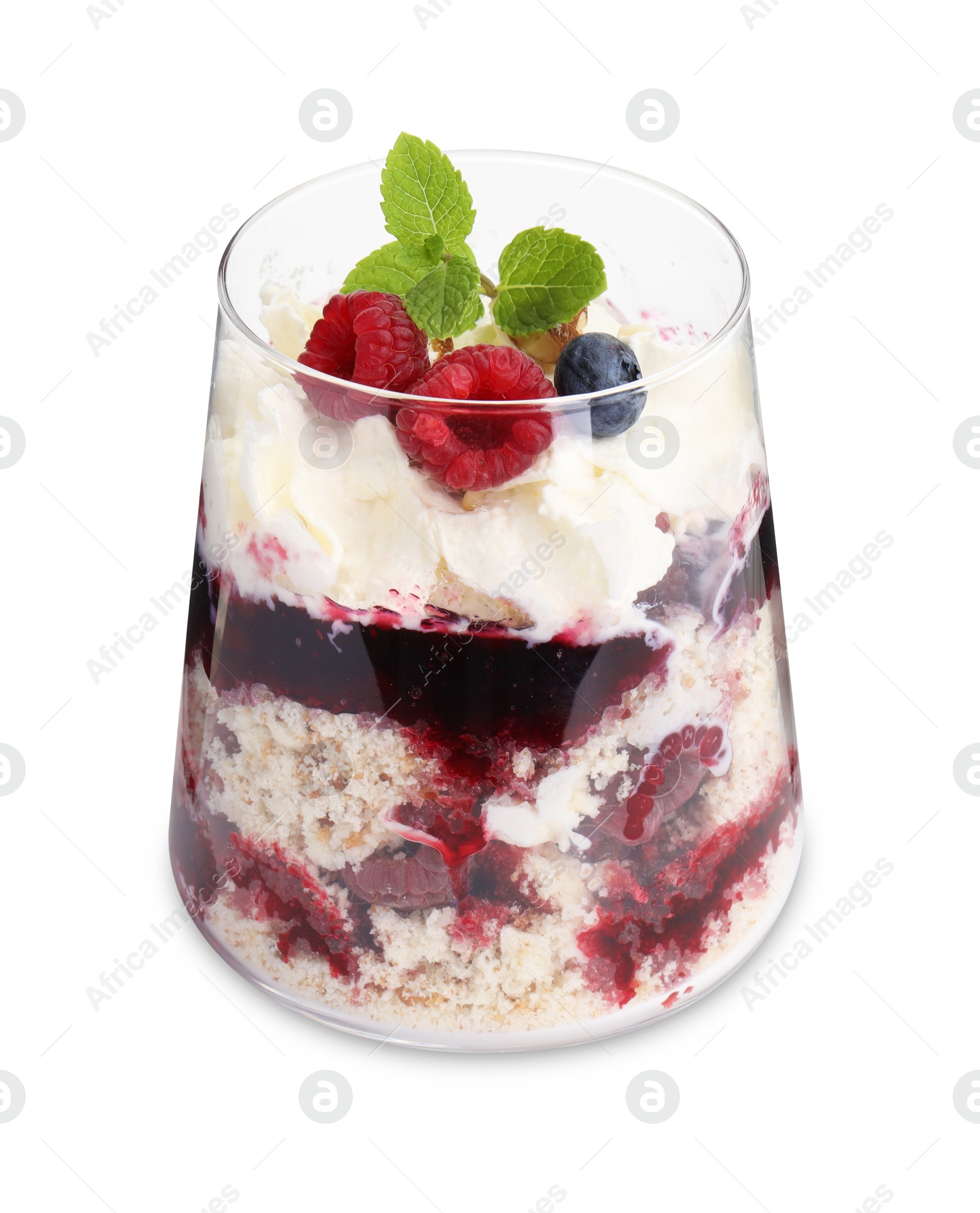 Photo of Tasty trifle dessert. Berries, sponge cake and whipped cream in glass isolated on white