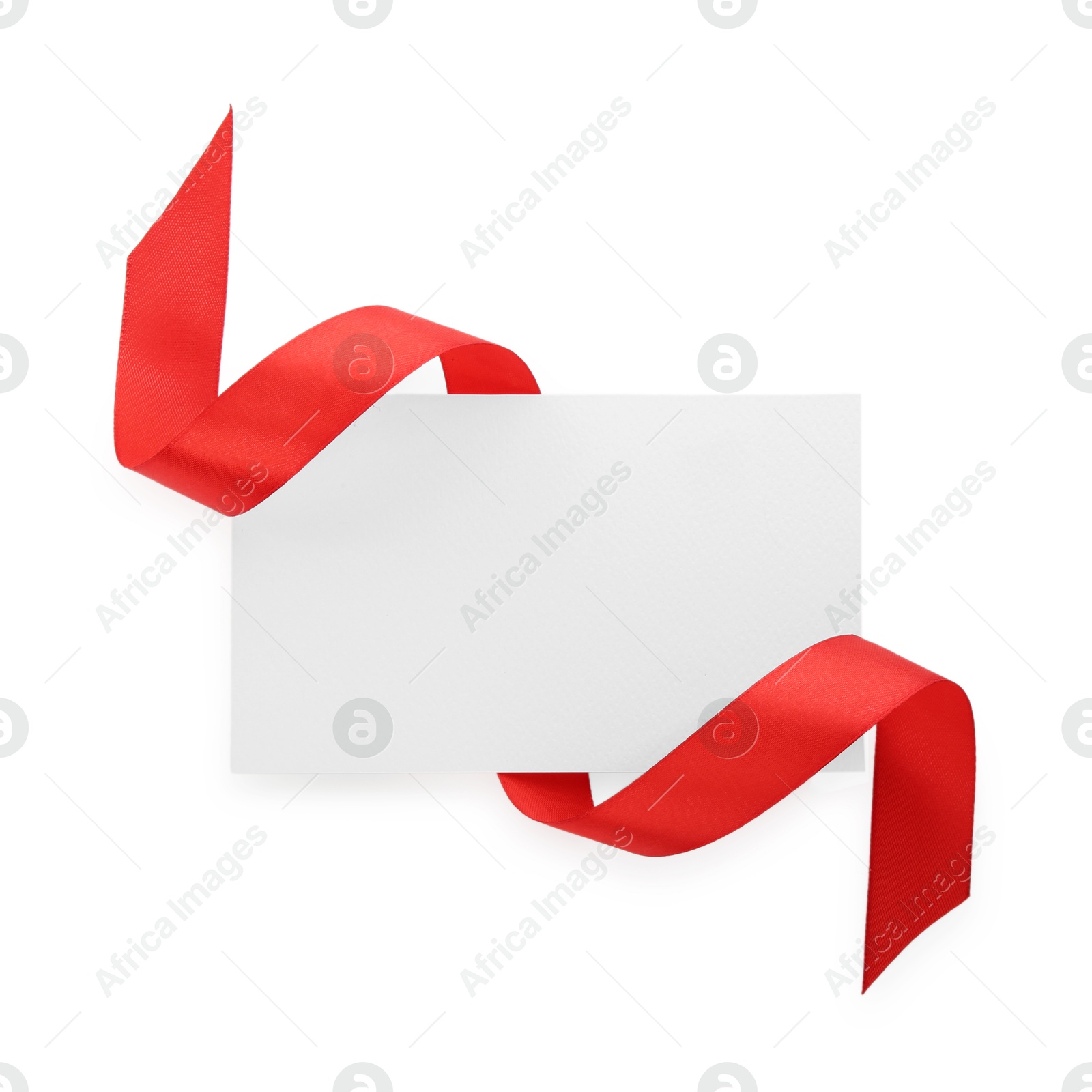 Photo of Blank card and red ribbon isolated on white, top view