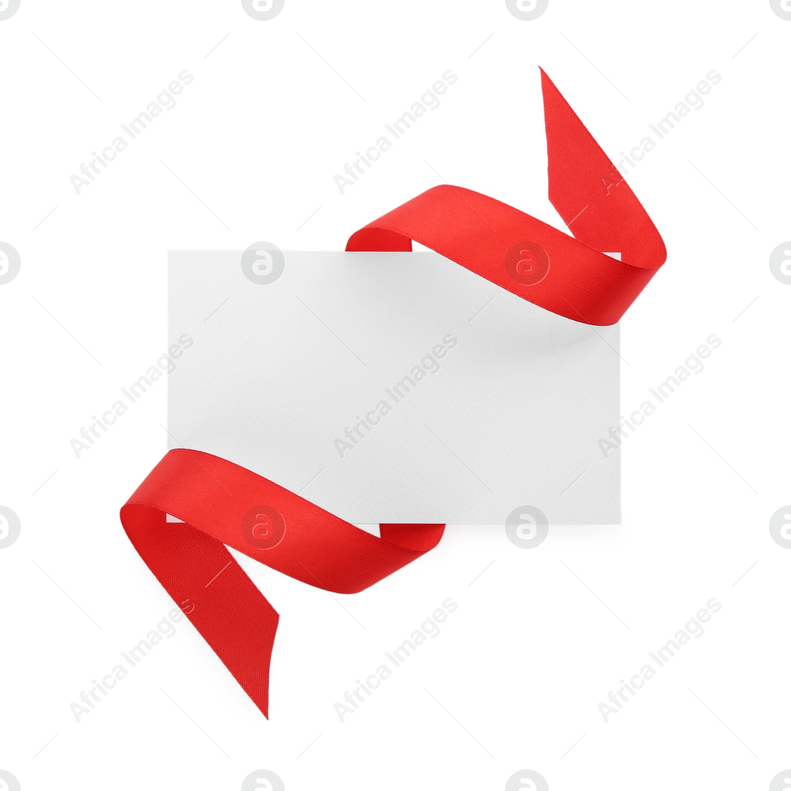 Photo of Blank card and red ribbon isolated on white, top view