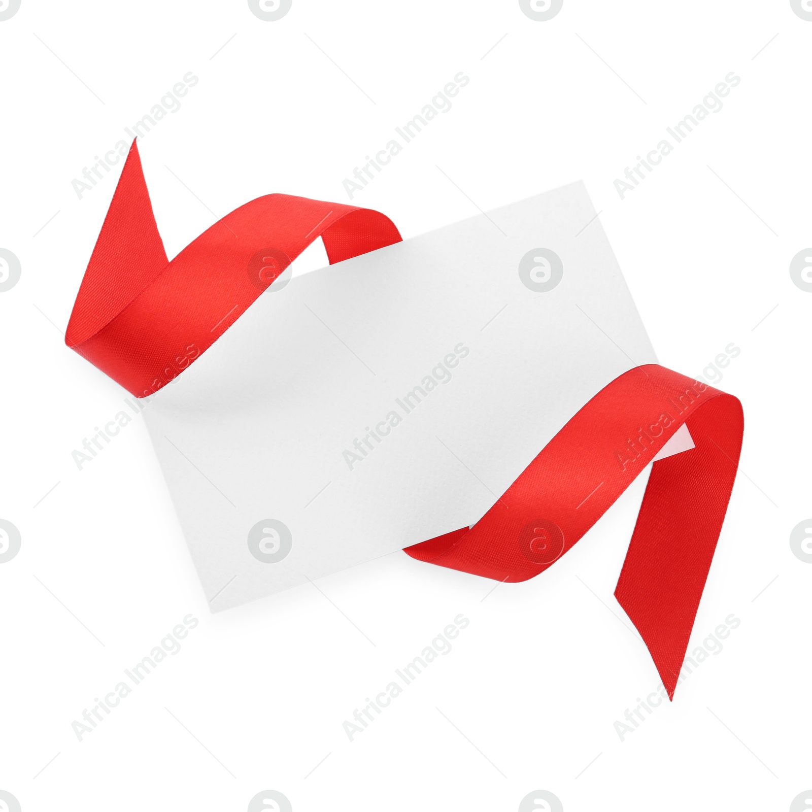 Photo of Blank card and red ribbon isolated on white, top view