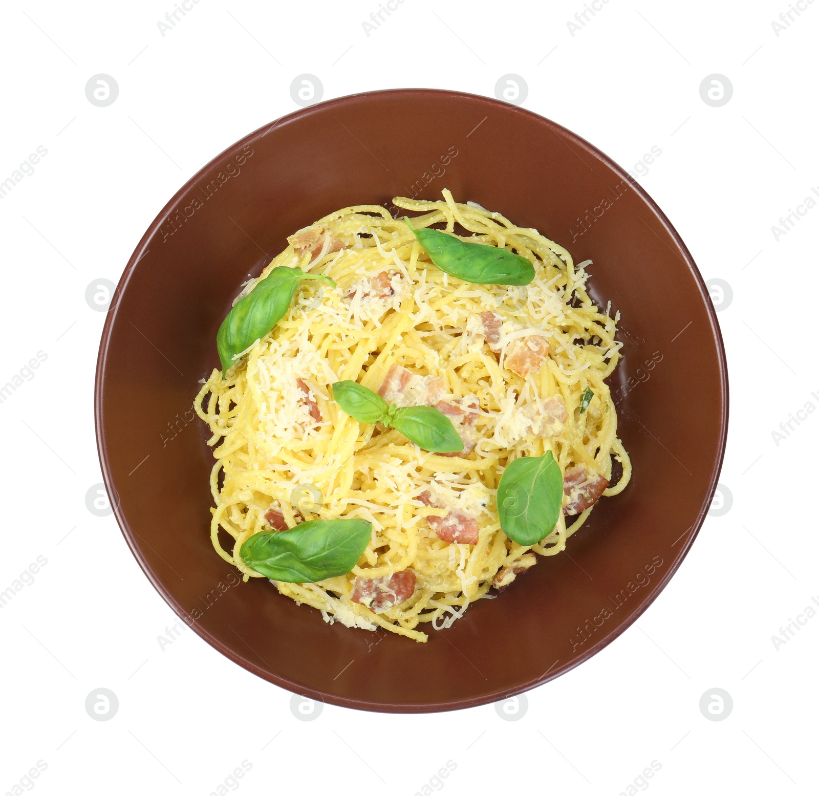 Photo of Delicious pasta Carbonara in bowl isolated on white, top view