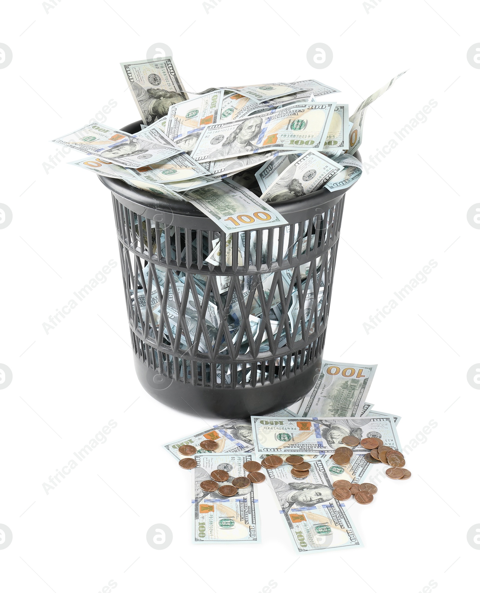 Photo of Many dollar banknotes in trash bin isolated on white