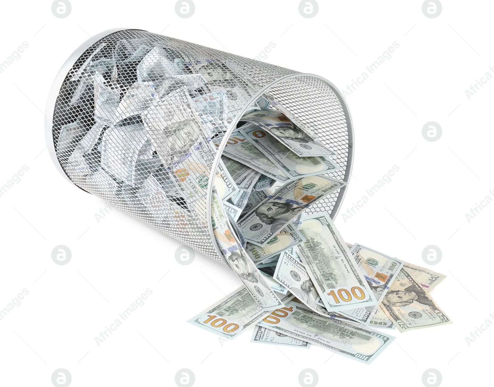 Photo of Many dollar banknotes and overturned trash bin isolated on white