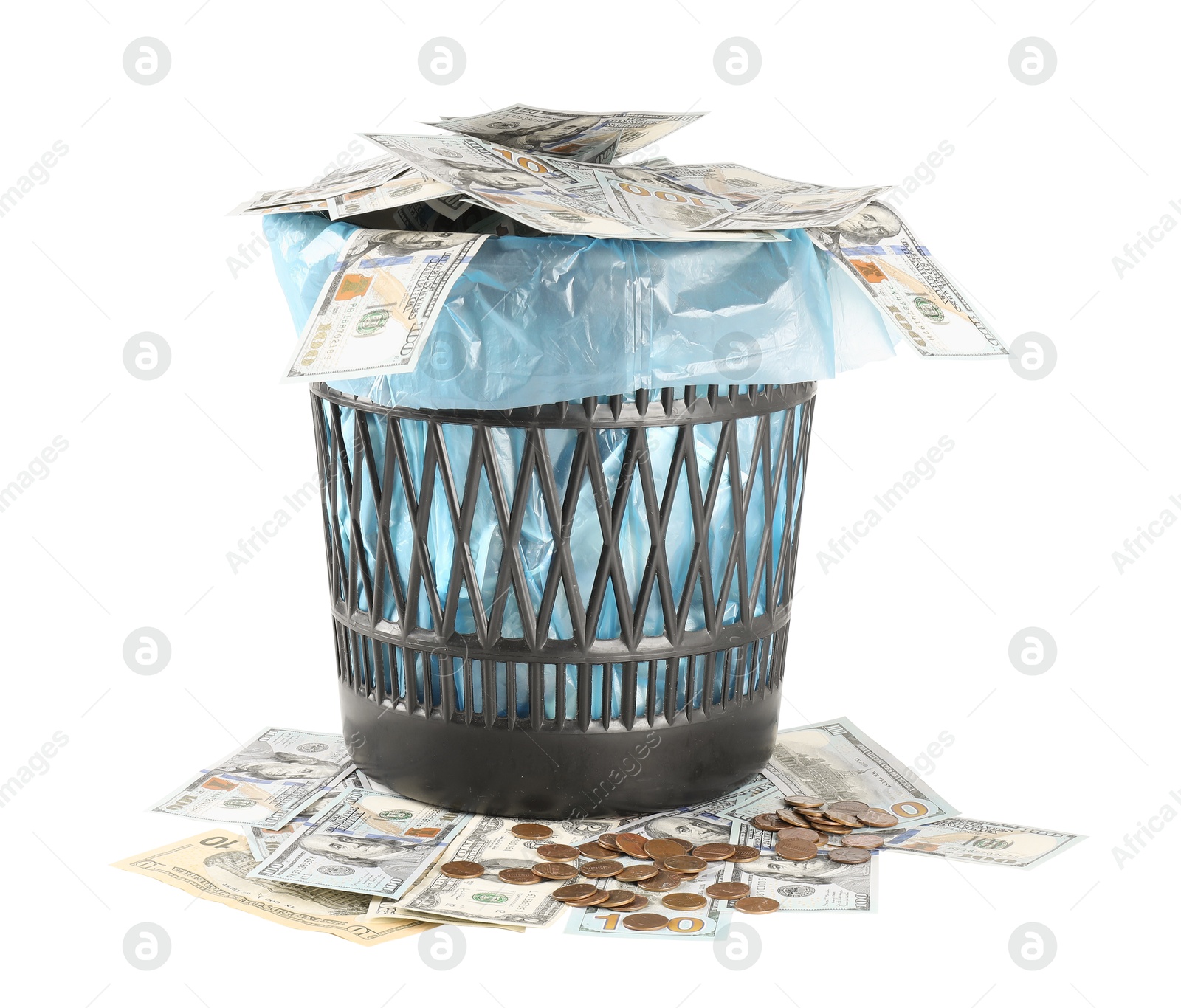 Photo of Many dollar banknotes in trash bin and coins isolated on white