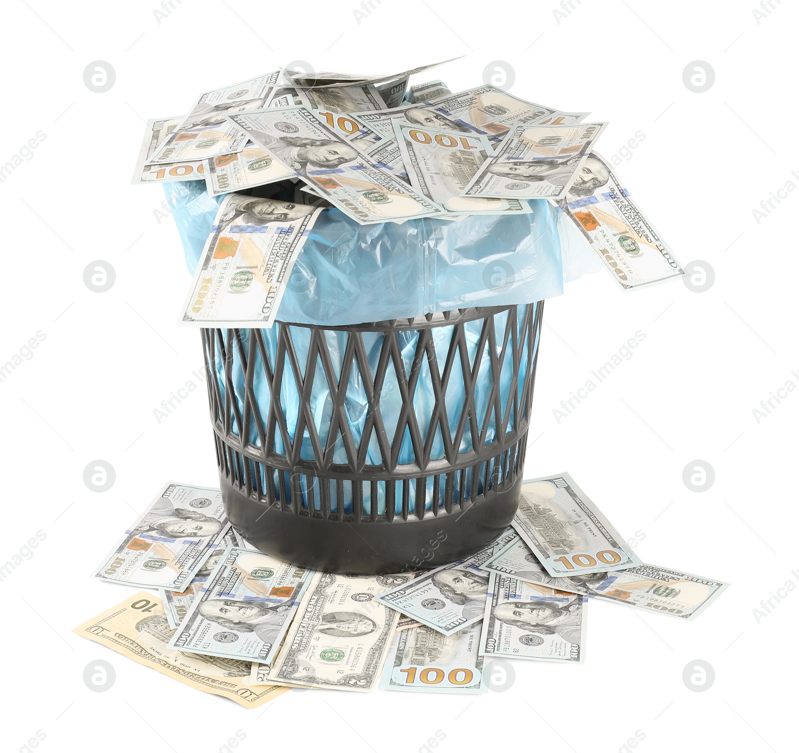 Photo of Many dollar banknotes in trash bin isolated on white