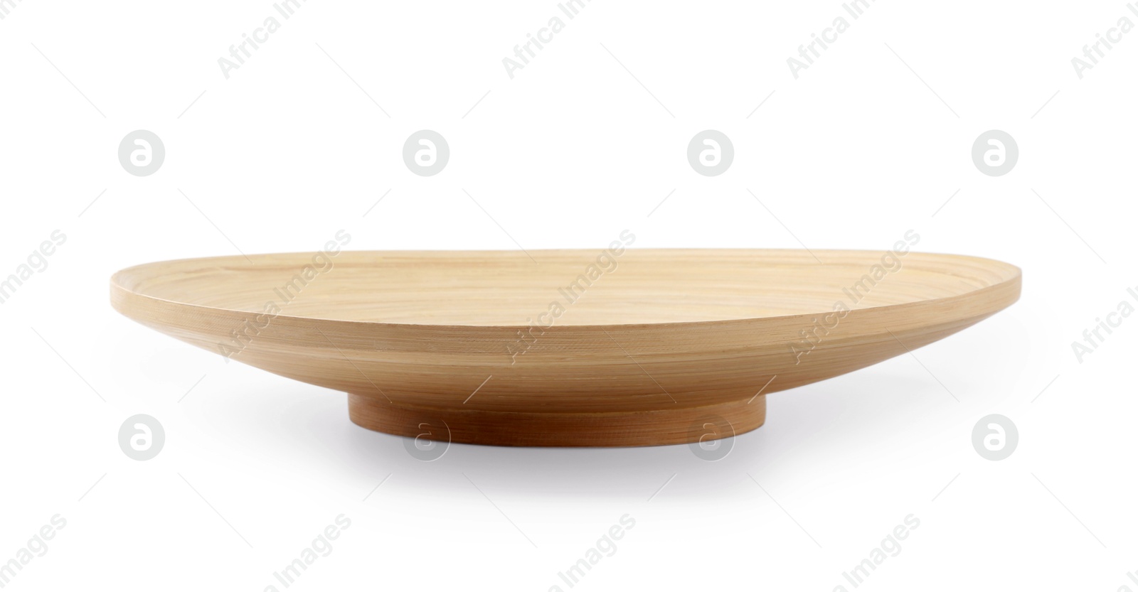 Photo of One wooden plate isolated on white. Tableware