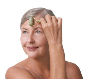 Beautiful woman doing facial massage with roller on white background