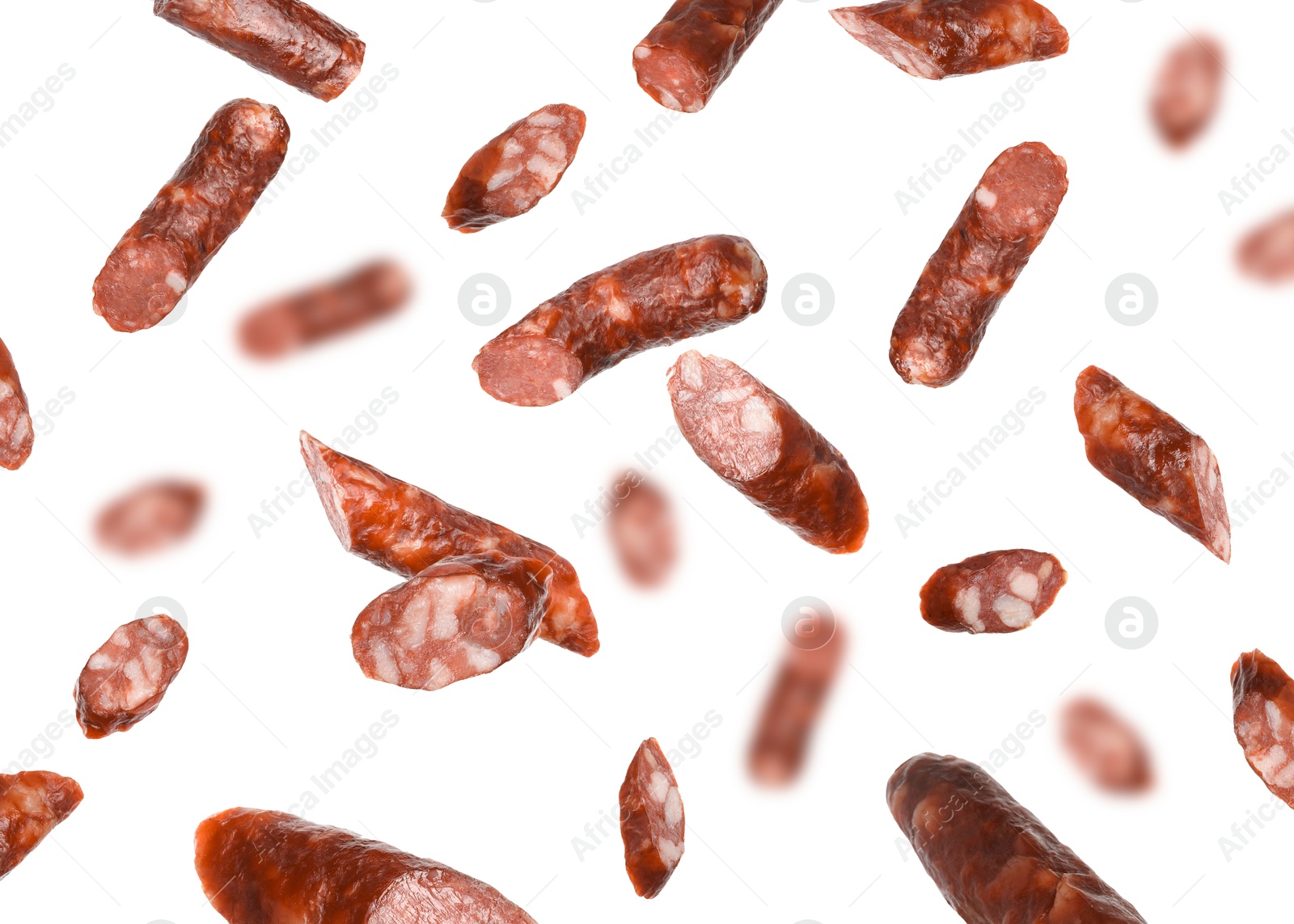 Image of Dry smoked sausage pieces in air on white background, collage